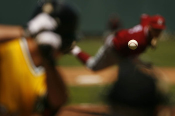 baseball-in-focus-pitcher-batter-blurred-out-of-focus.jpg
